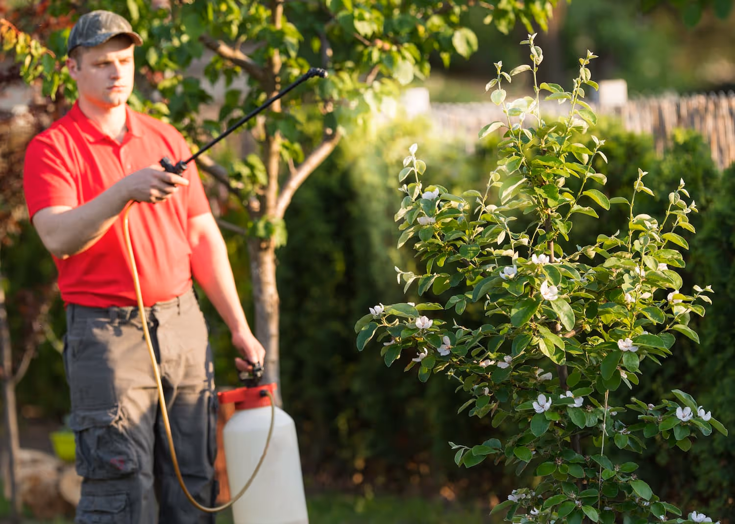 Pest control technician answering service hero background
