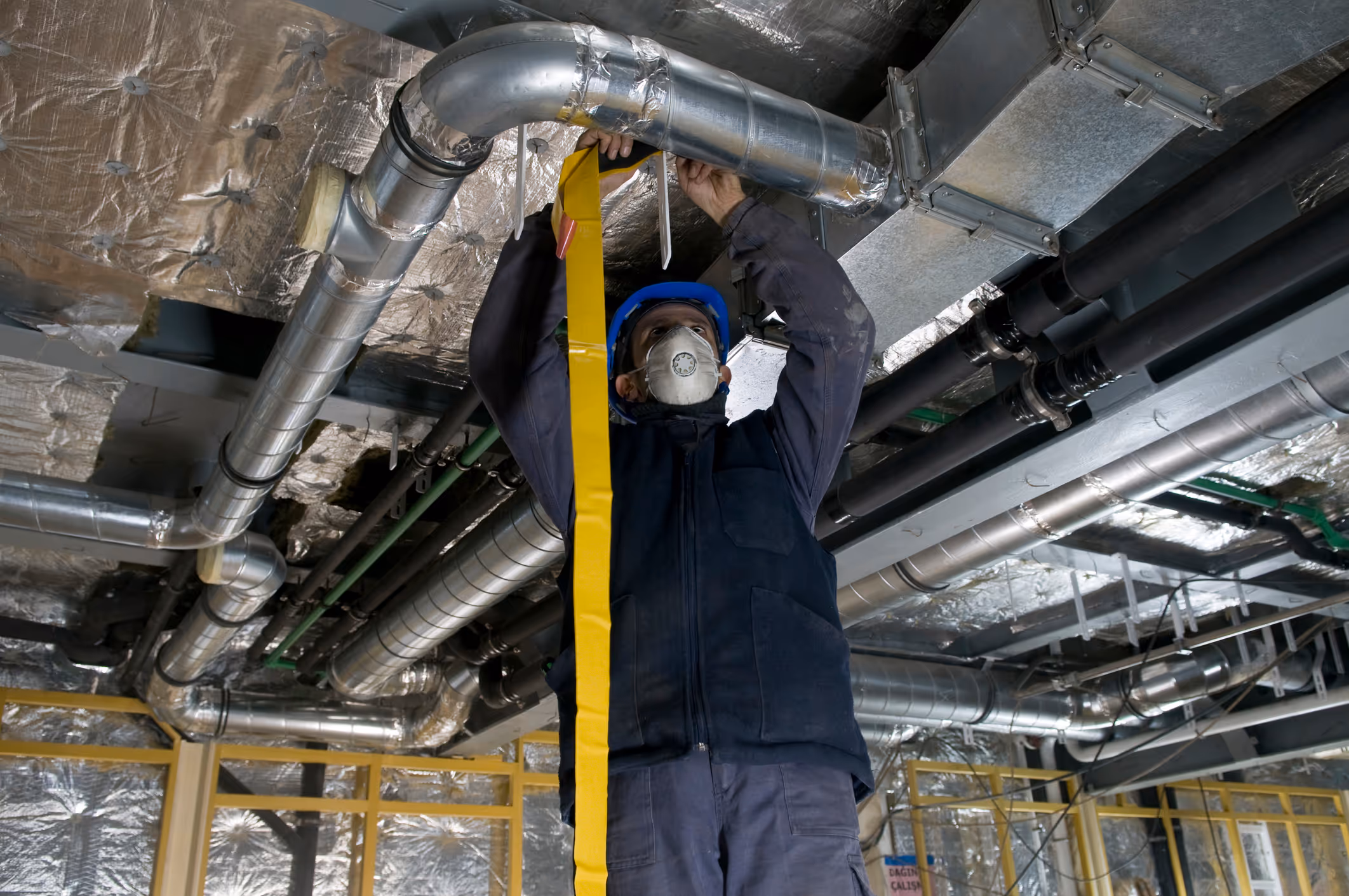 HVAC professional helping a homeowner